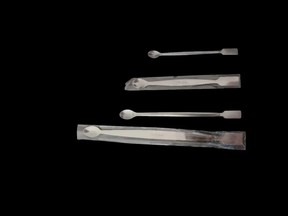 Spatule en inox avec un coté cuillère 230 mm